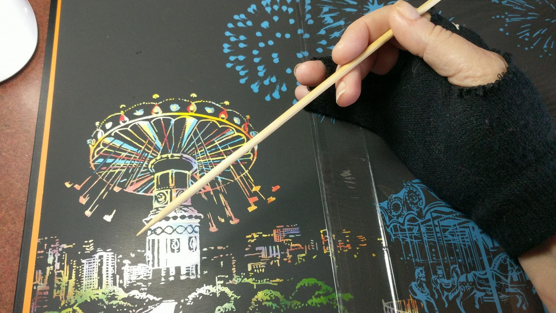 Customer photo of finished scratch art